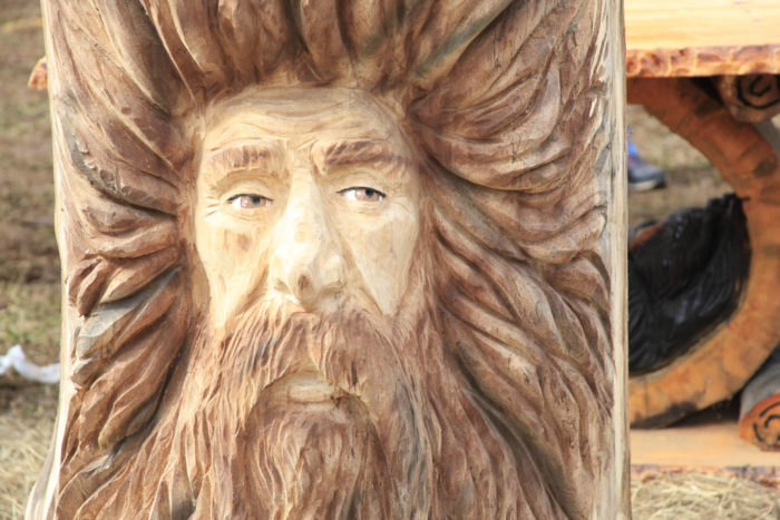 Chainsaw carving of a face made of wood