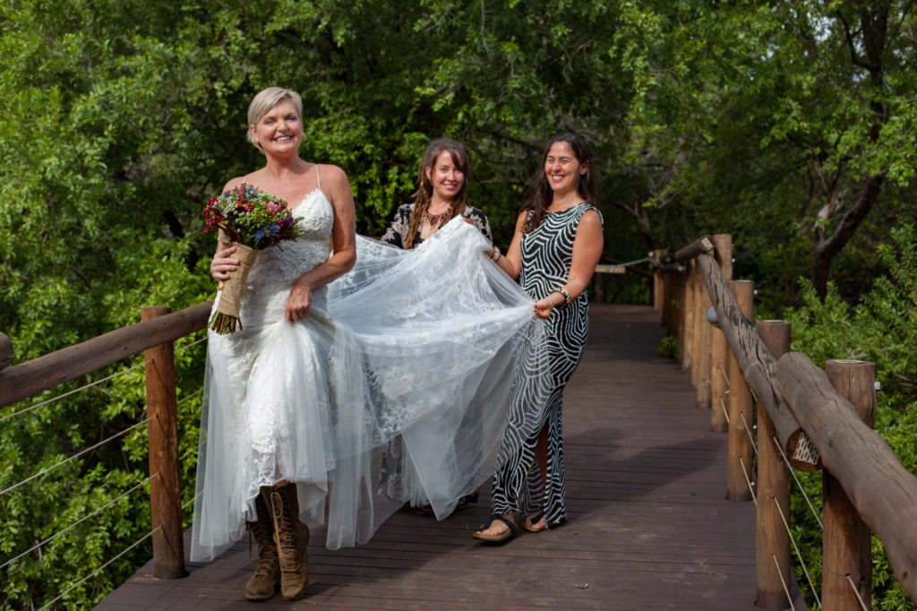 South African wedding bride portrait with boots and wedding dress