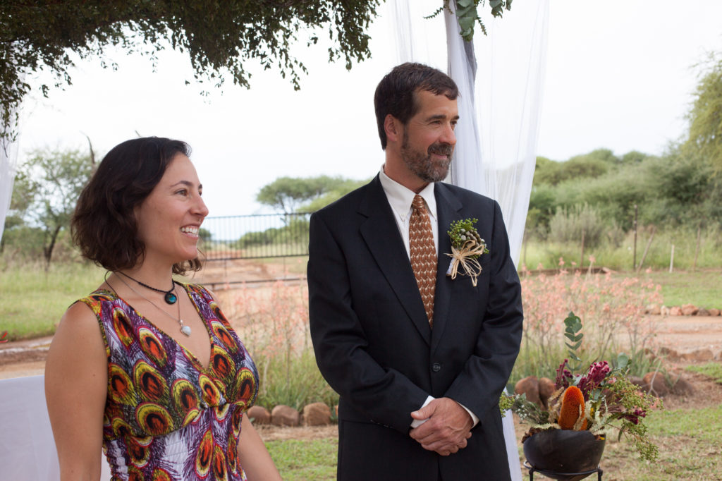 Andy and Tovah wait at the alter at the wedding ceremony in South Africa