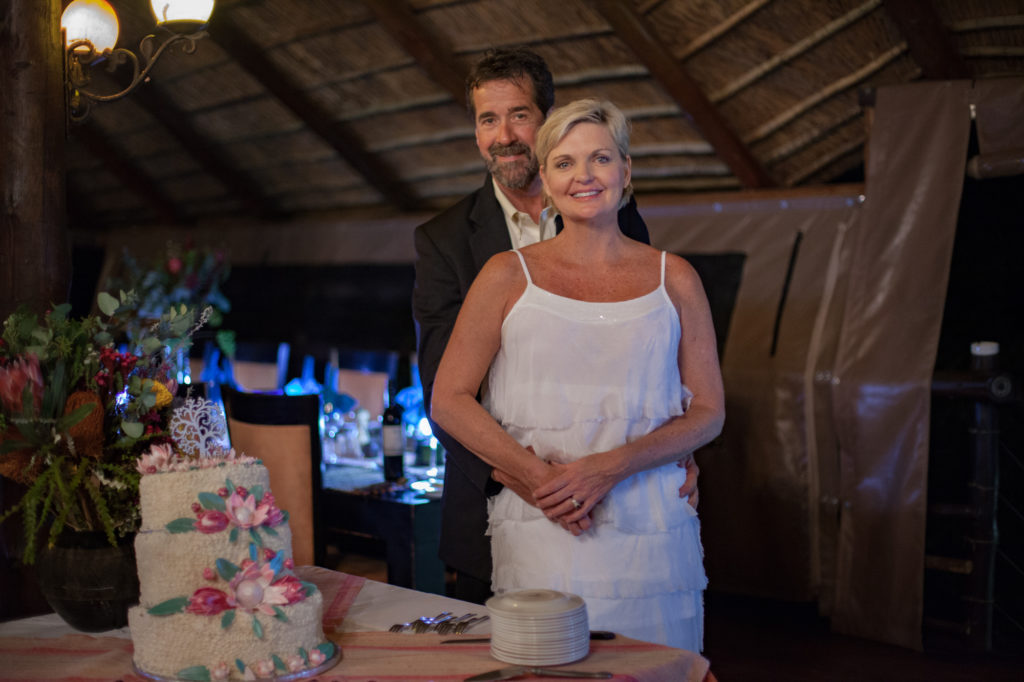 bridal portrait by wedding cake in South African Madikwe River Lodge